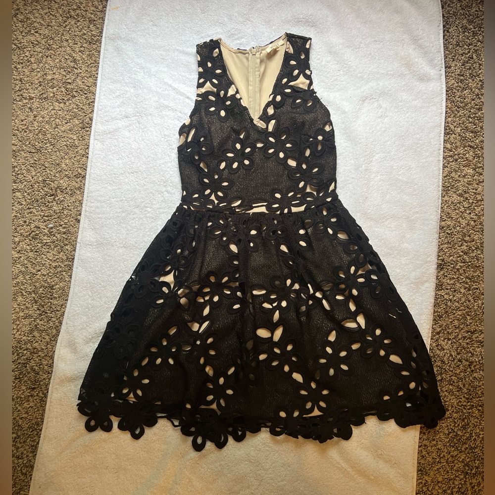 Francesca’s XS Black and Nude mini dress floral
